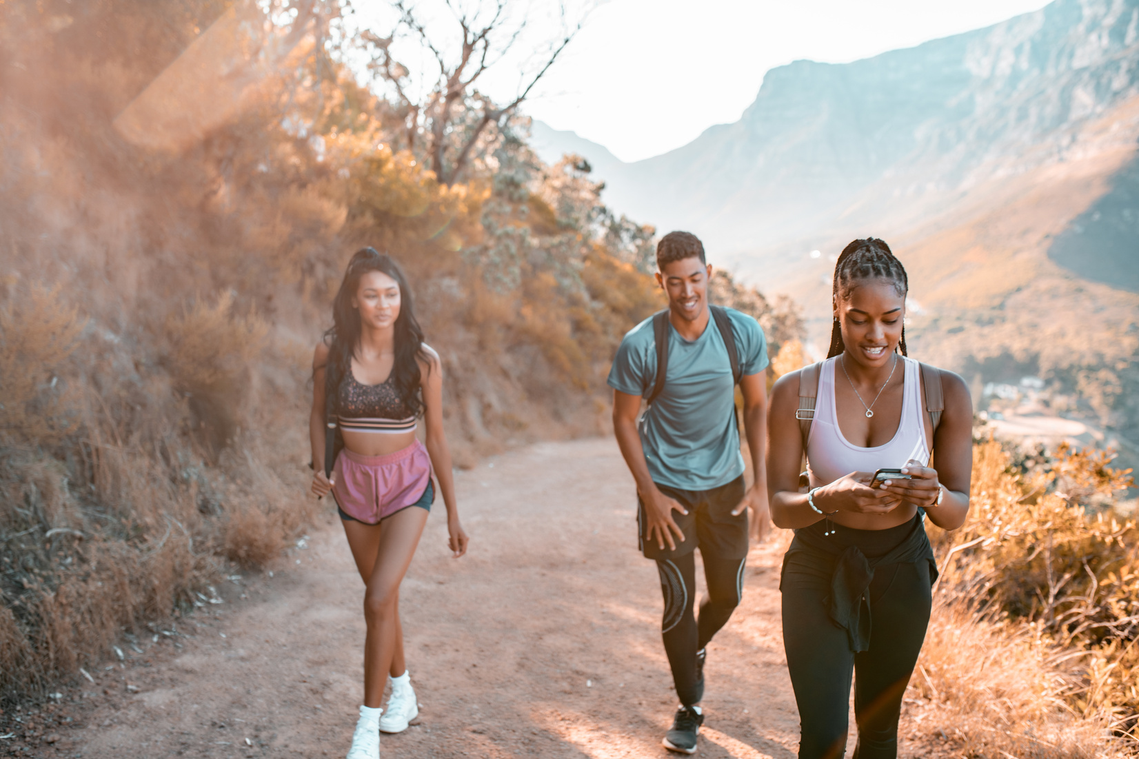 Group of young people hiking.